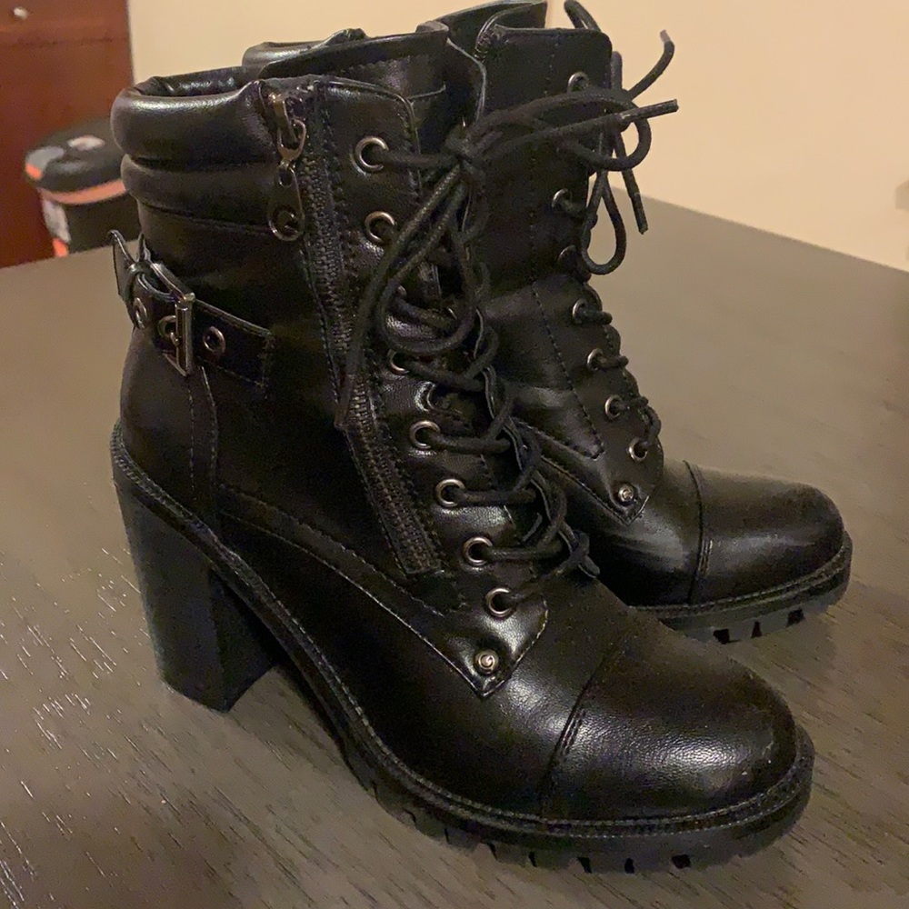 Black leather combat boots; side zip/ front laced